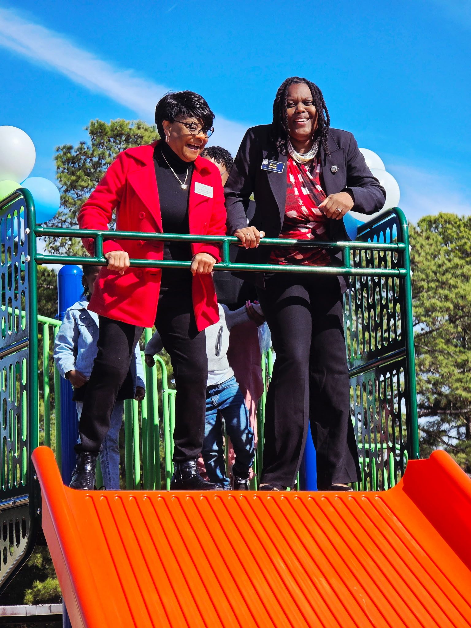 Jamie Adams going down a slide